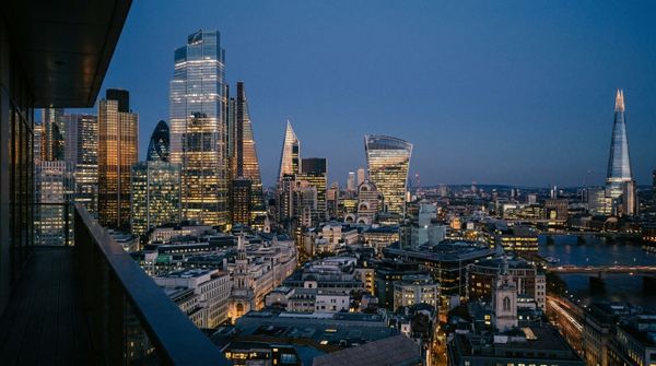 The City of London financial district at dusk, representing the 2025 reform of offshore trusts