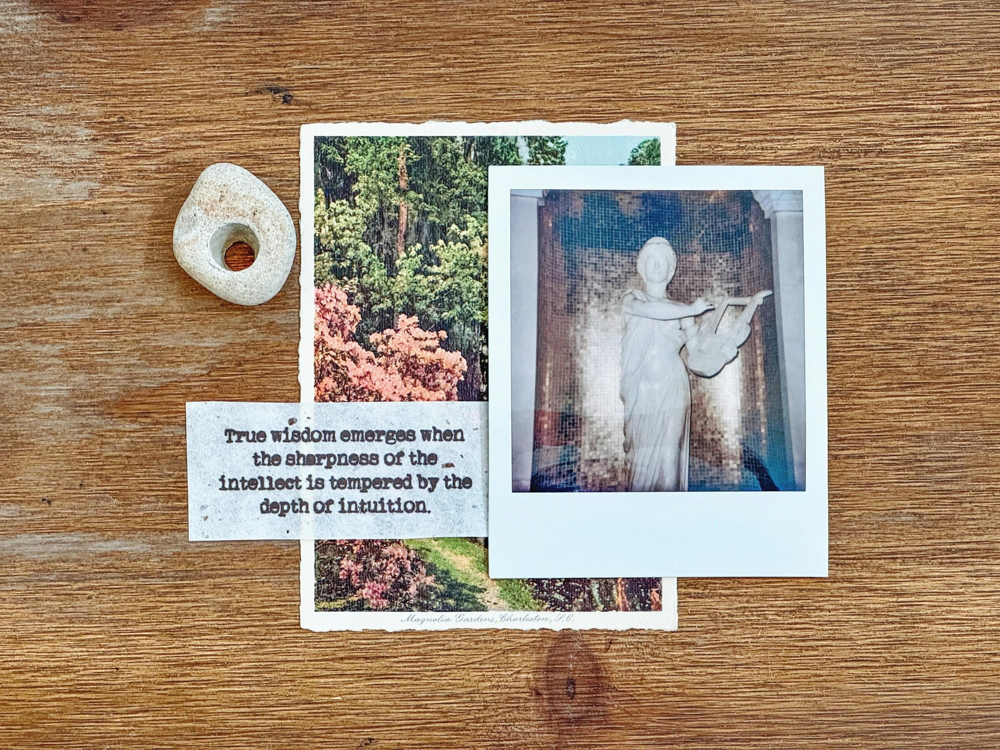 Kodak photos. A slip of paper with the words "true wisdom emerges when the sharpness of the intellect is tempered by the depth of intuition"