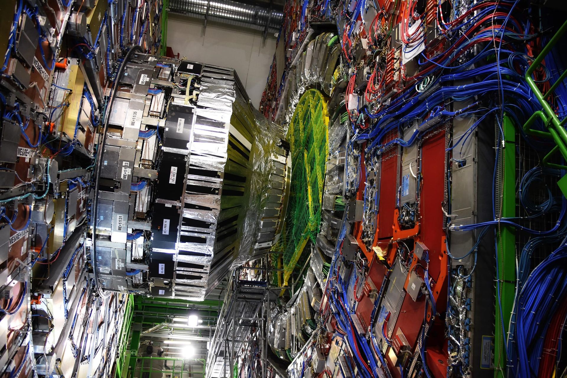 The CMS particle detector at CERN, photographed inside the Large Hadron Collider facility in 2019 - Large Physics Model
