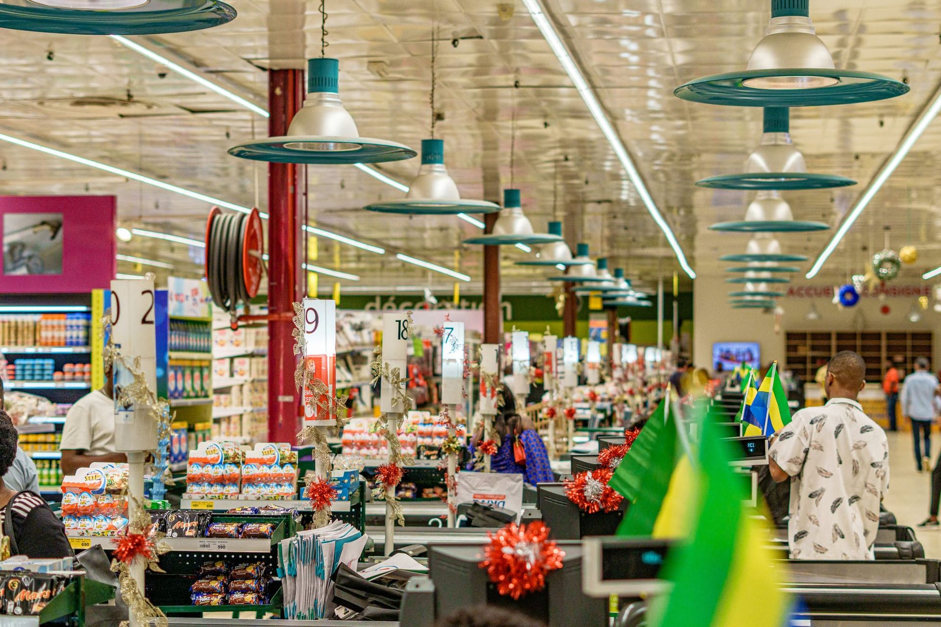 Inside of a supermarket grocery store with isles and cash resgister - Dollar General pricing lawsuit