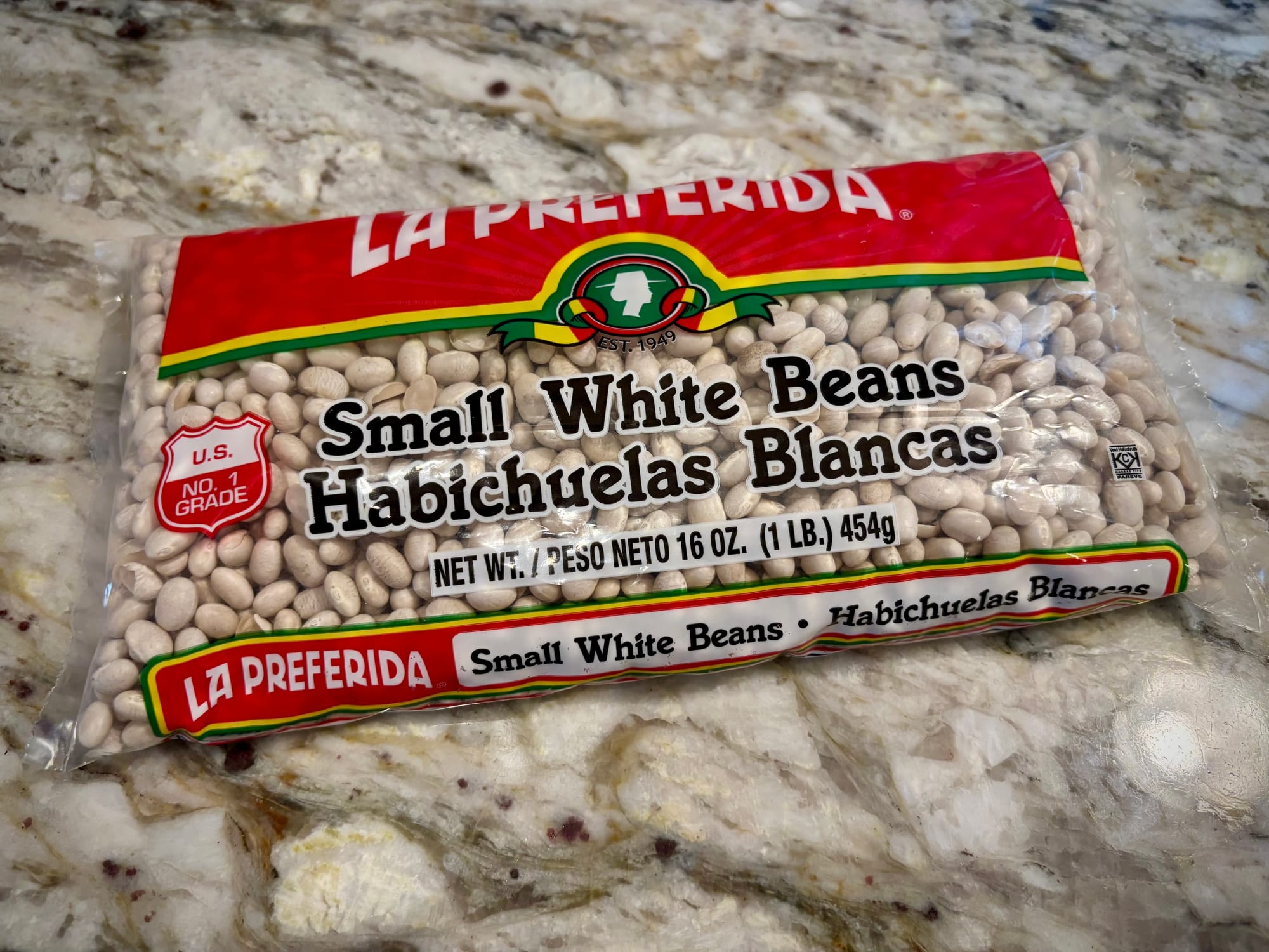 A bag of La Preferida brand small white beans
