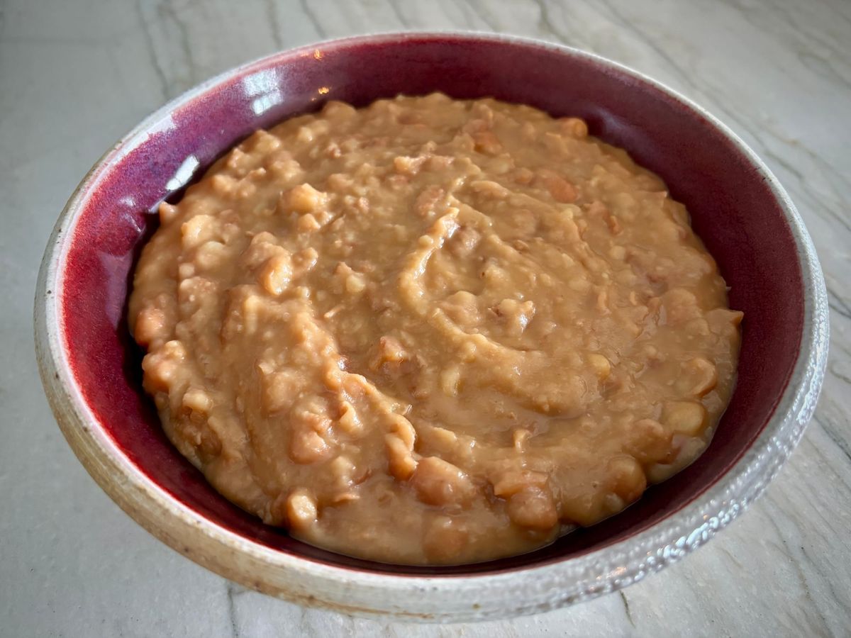 Refried mayocoba beans in a bowl