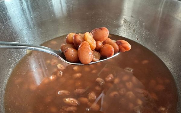 A spoonful of cooked cranberry beans