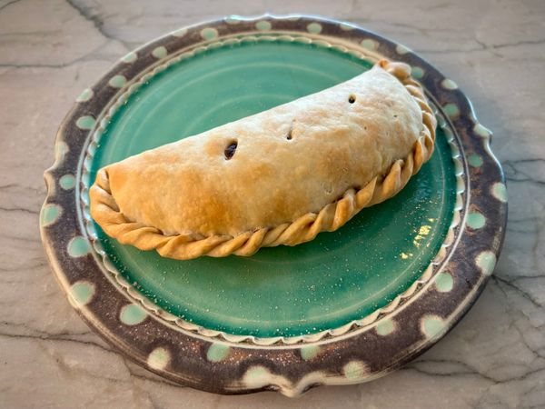 An empanada on a plate