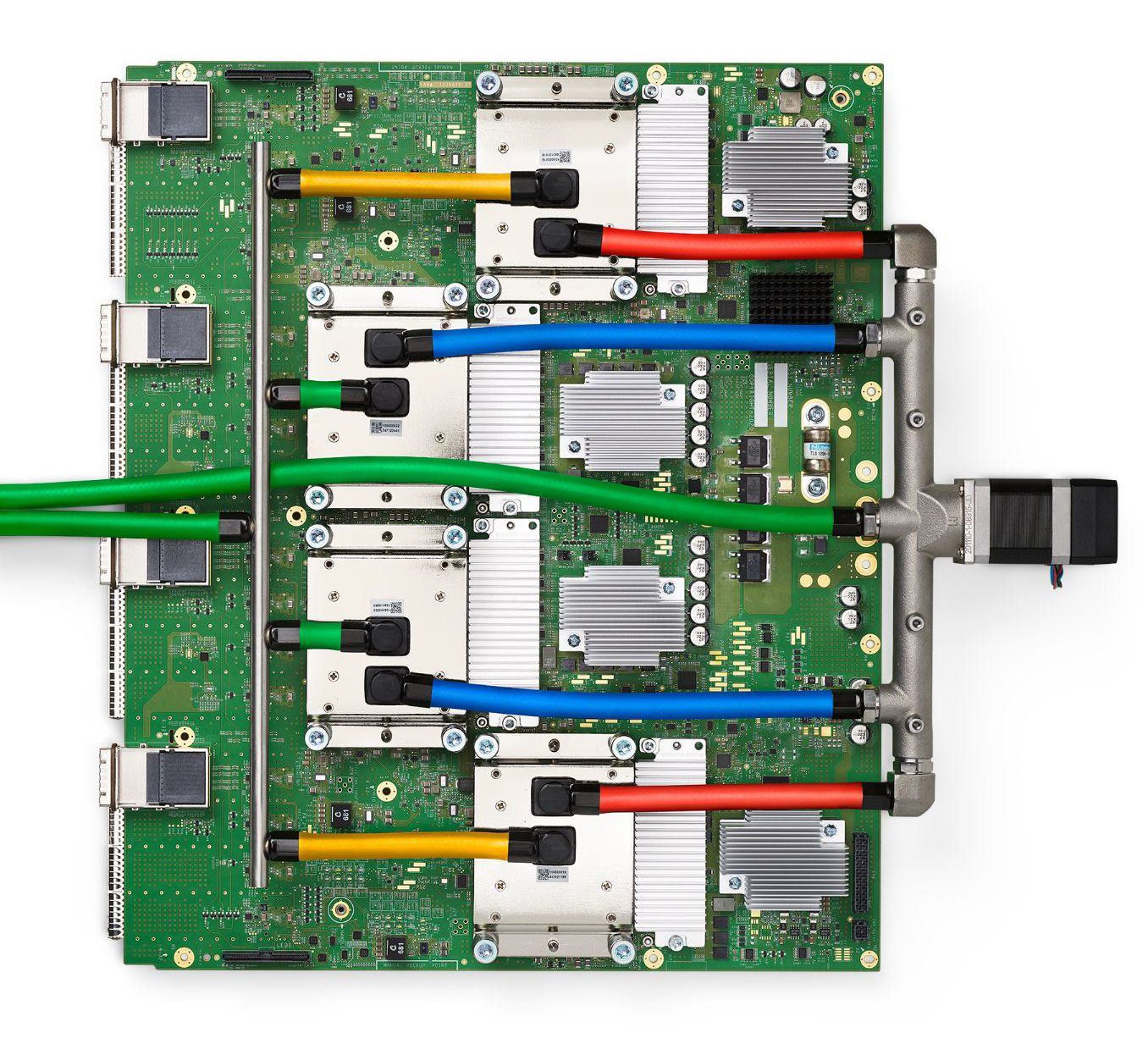 A Google TPU v4 board with four liquid-cooled accelerator packages