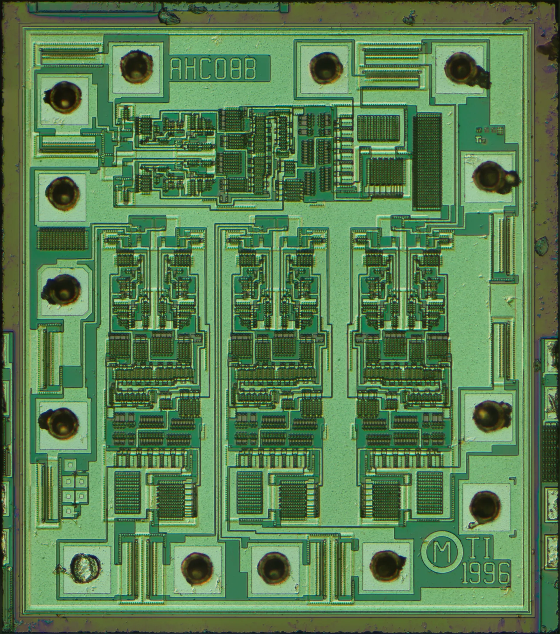 Optical die photograph of a Texas Instruments AHC08 four two-input AND gate integrated circuit