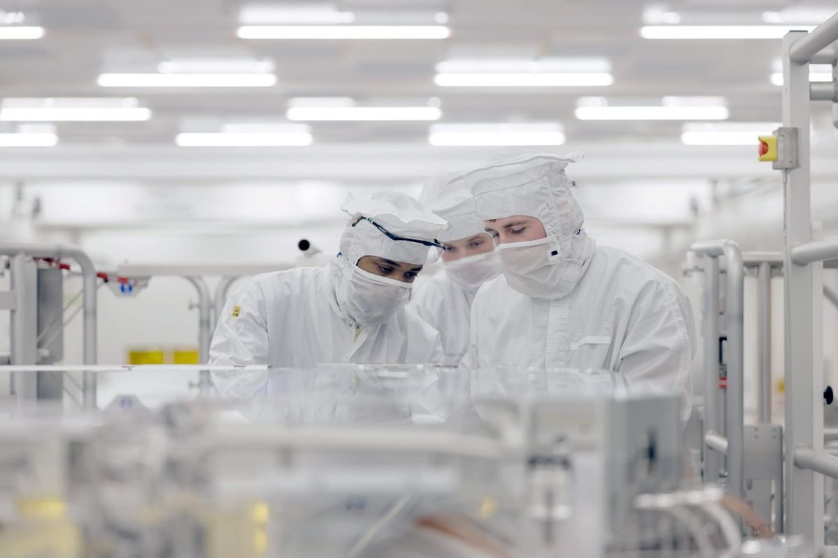 Workers in the ASML High NA cleanroom in Veldhoven
