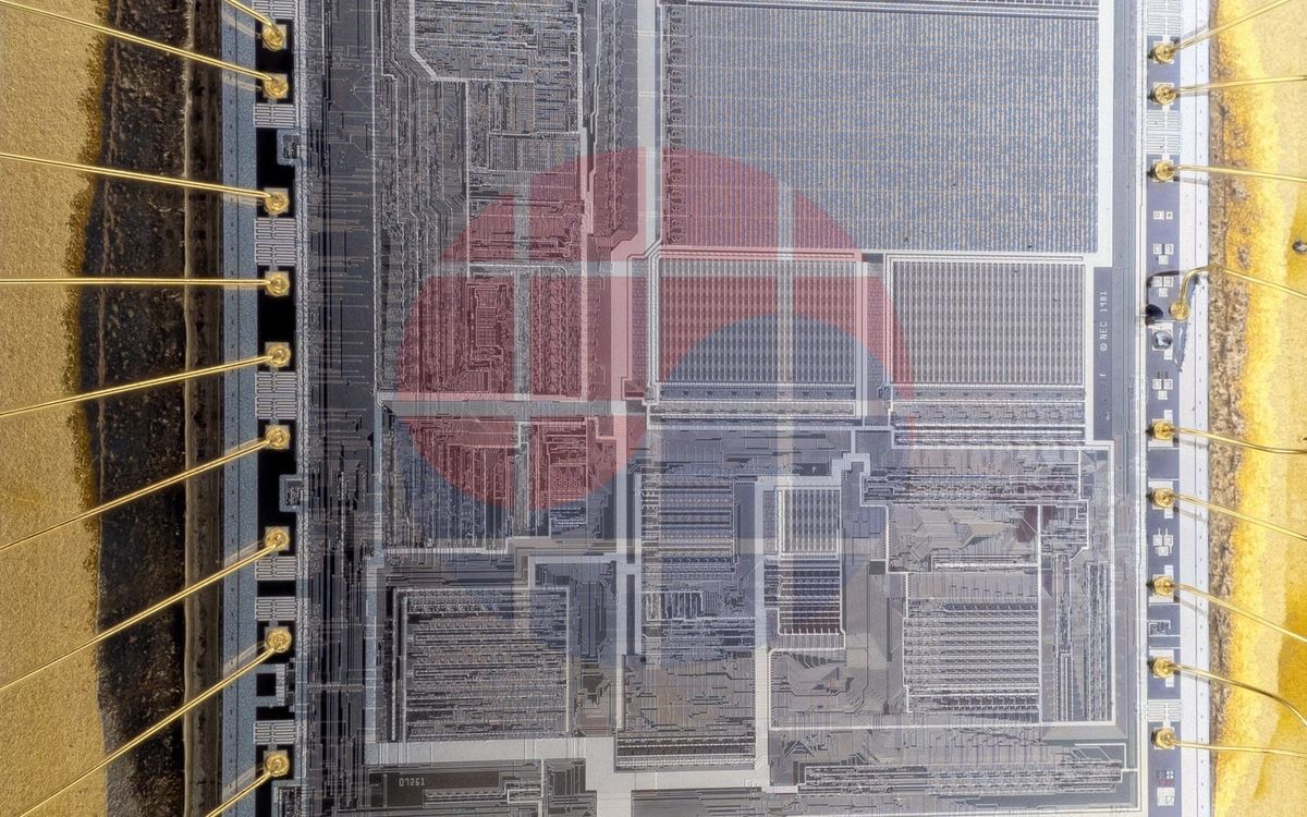 An exposed integrated-circuit die and package bond wires; generic context photograph.