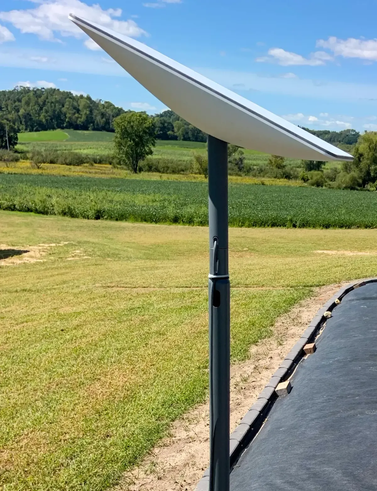 Pole-mounted Starlink ground user terminal photographed on July 1, 2024