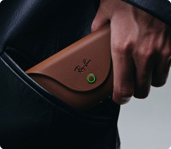 The Ray-Ban Meta Gen 2 charging case being taken from a pocket. Official photograph: Meta, 2025.