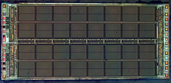 Historical Micron MT4C1024 DRAM die showing repeated memory-array regions and peripheral circuitry.