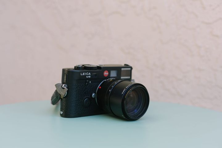 Leica M6 on a light blue table