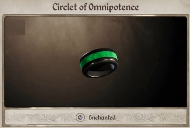 A black metal ring with a green stone band running through the middle of it.