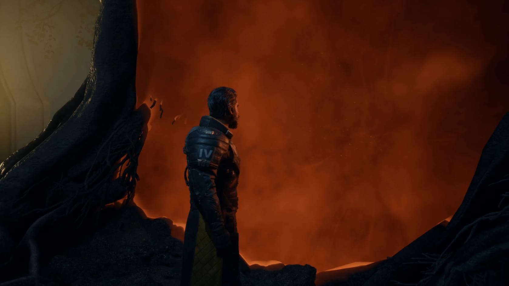 Arjun stands in front of a gold-orange portal in the trunk of a Banyan Tree.
