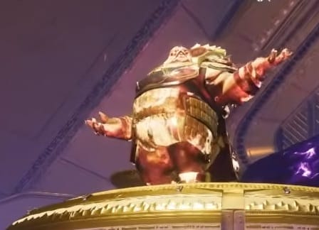Emperor Calus stands on his throne