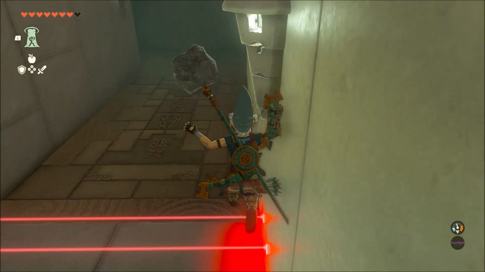 Link jumping over the final set of laser from the stairs.
