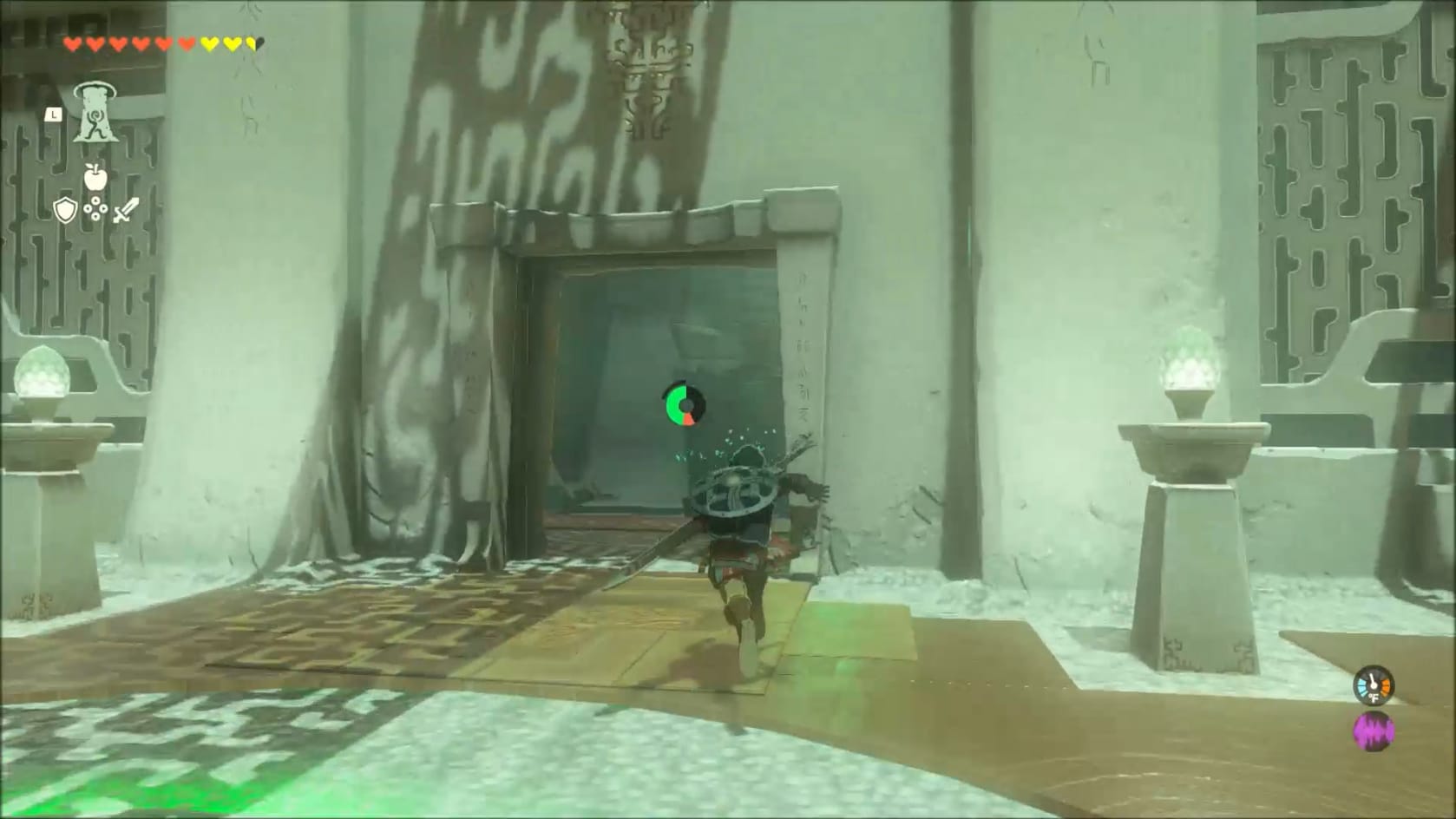 Link running inside the open doorway leading to the Innermost Chamber