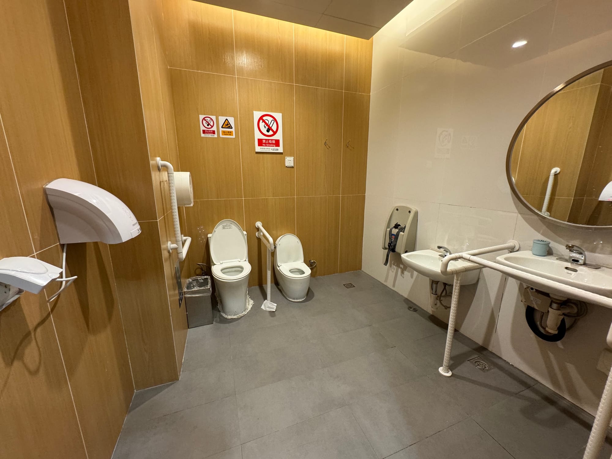 Modern public toilet in Beijing with Western-style facilities and tiled walls