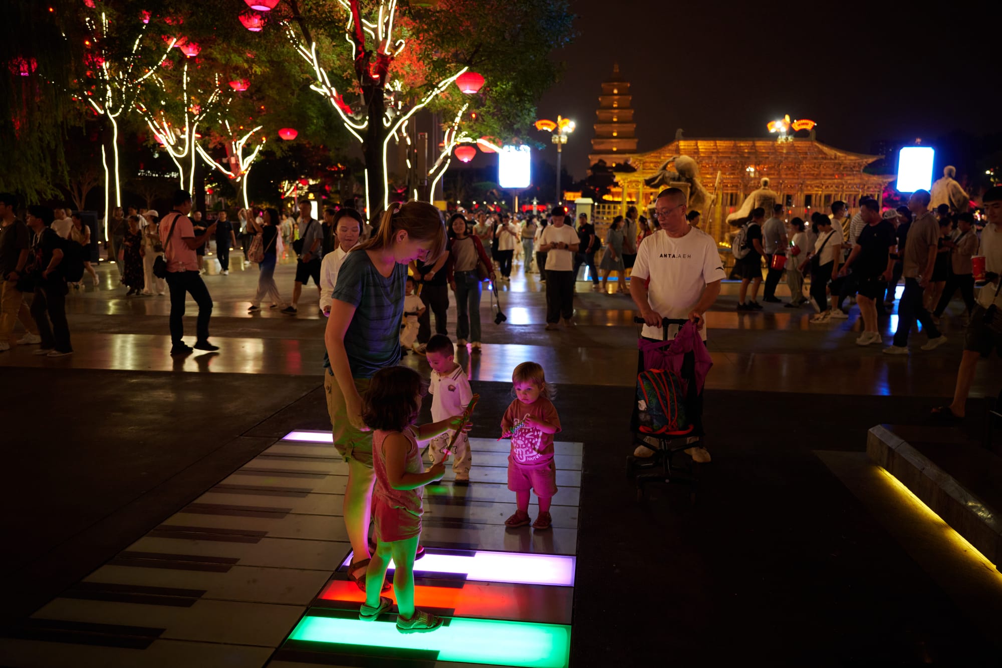 Pedestrian street near the Big Wild Goose Pagoda lit up at night