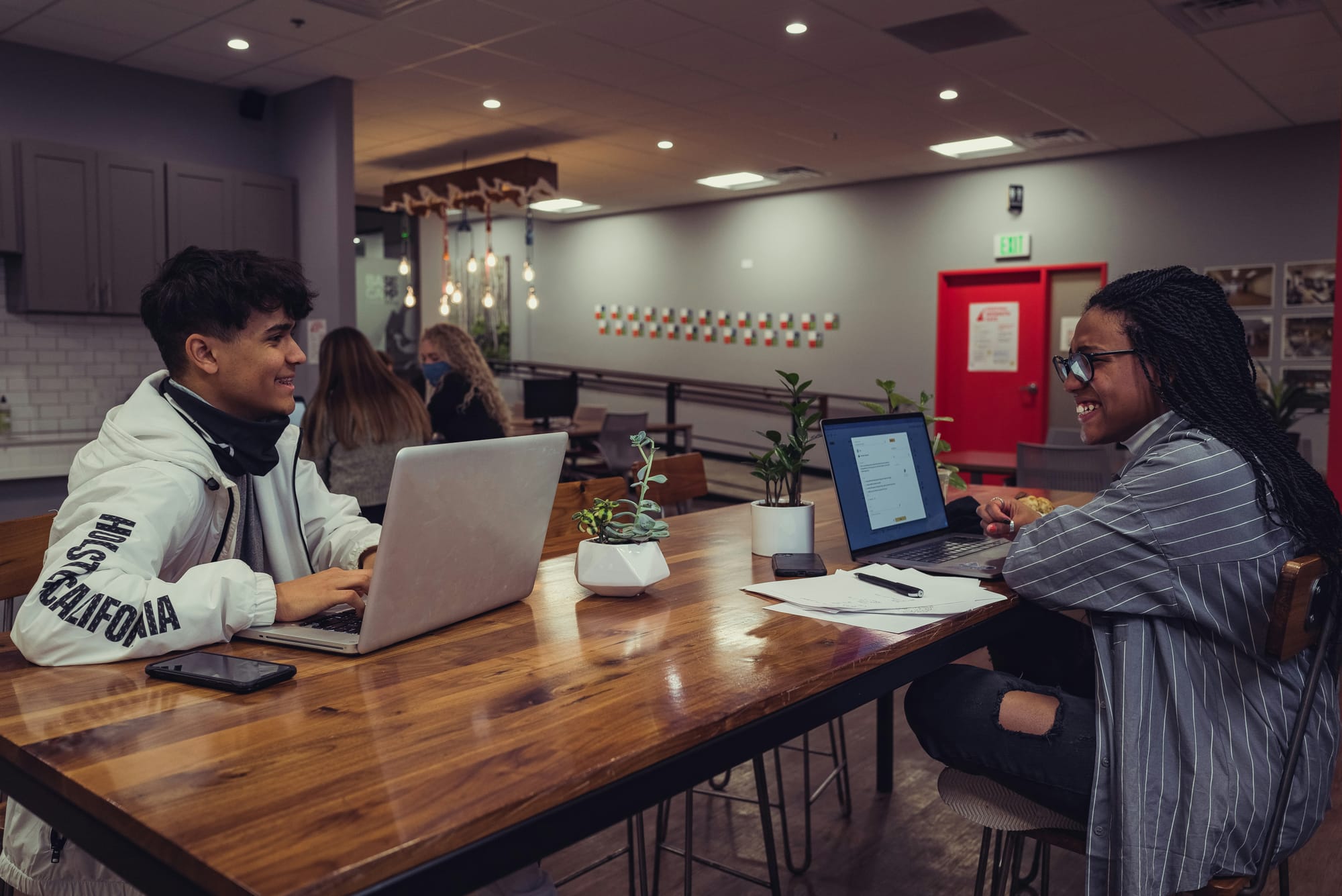 team discussing methods of content distribution