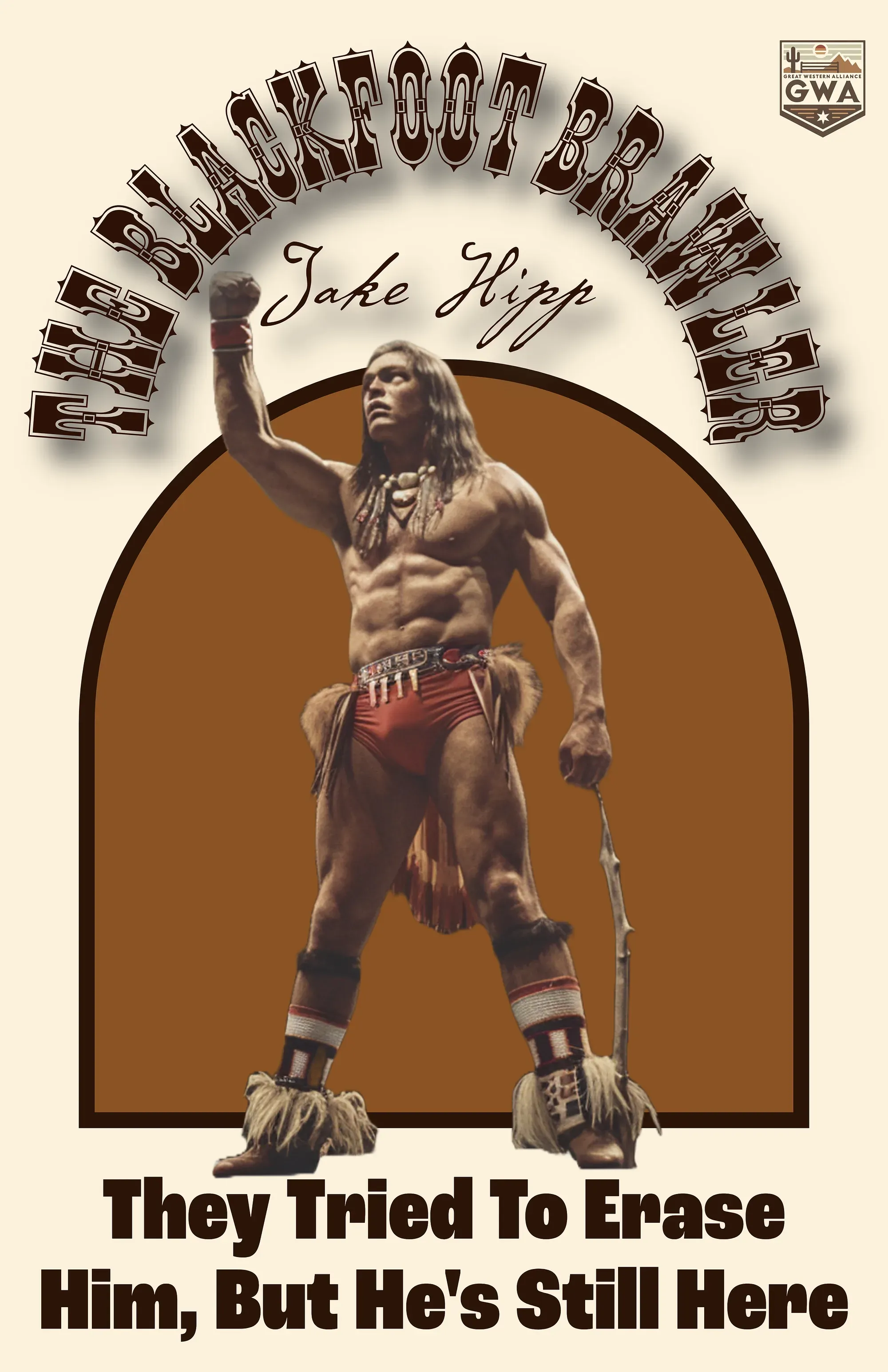 Jake Hizpp stands shirtless with fist raised, wearing red fringed shorts and Native American-inspired accessories against a brown arched background.