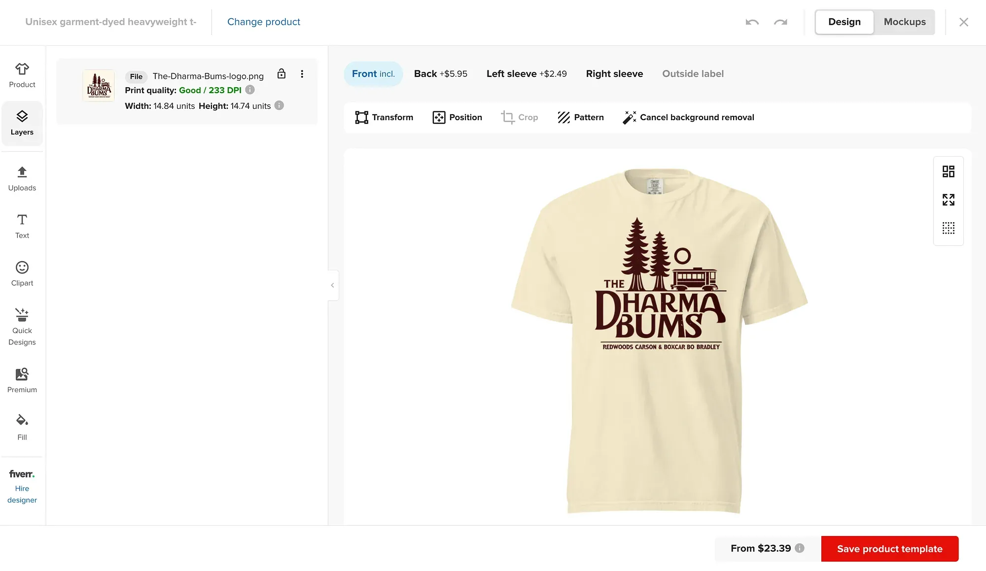Cream-colored t-shirt with burgundy Dharma Bums logo featuring pine trees and cabin design displayed in an online design editor interface.