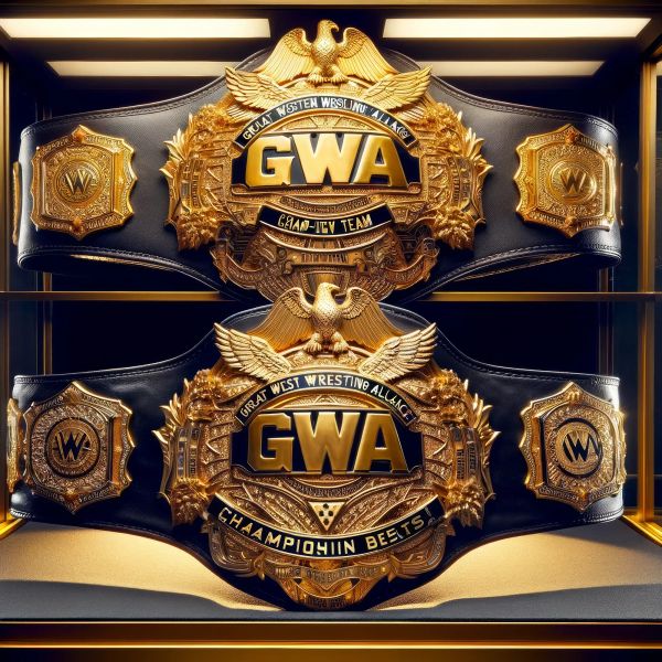 Two ornate gold and black GWA championship belts displayed on a shelf with eagles and decorative medallions.