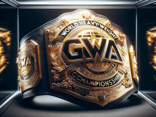 GWA World Heavyweight Championship belt displayed in a lit case, featuring gold and black metalwork with ornate decorative details.