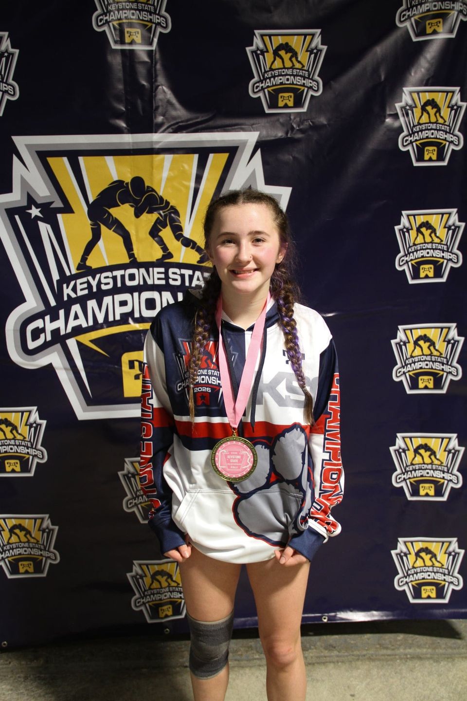 She Walked Into a Wrestling Room Alone. Now She’s Carrying a Program With Her.