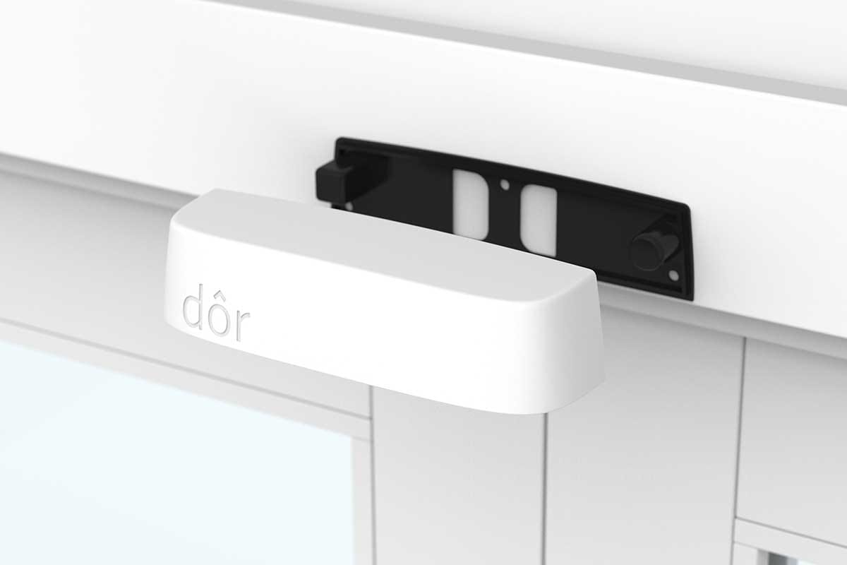 Dor thermal sensor being installed above a retail store entrance