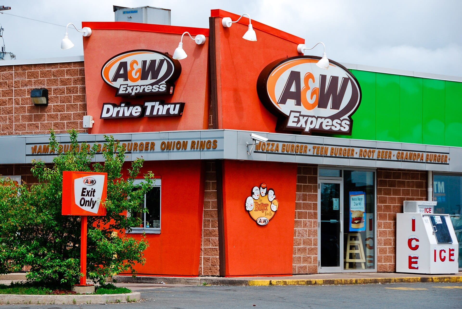 An A&W fast food restaurant exterior with a drive-thru lane