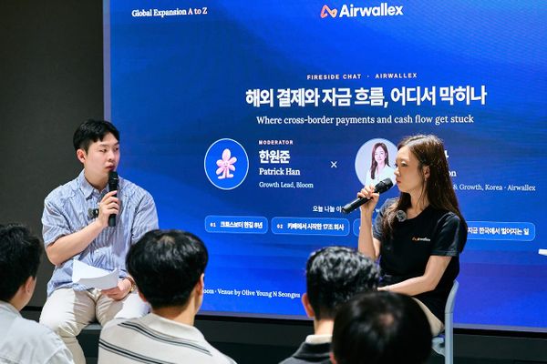 Yuna Kwon and the host seated in front of the Airwallex session screen