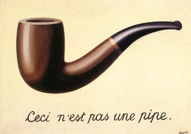 The treachery of image by Rene Magritte