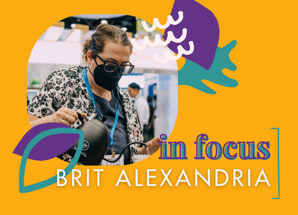 In focus header image with Brit making coffee and text overlay: In focus Brit Alexandria