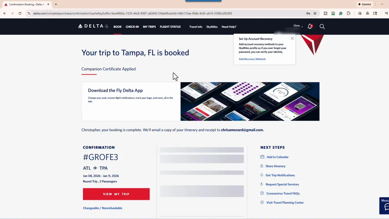 Delta booking confirmation page with headline 'Your trip to Tampa, FL is booked' and 'Companion Certificate Applied' notice.