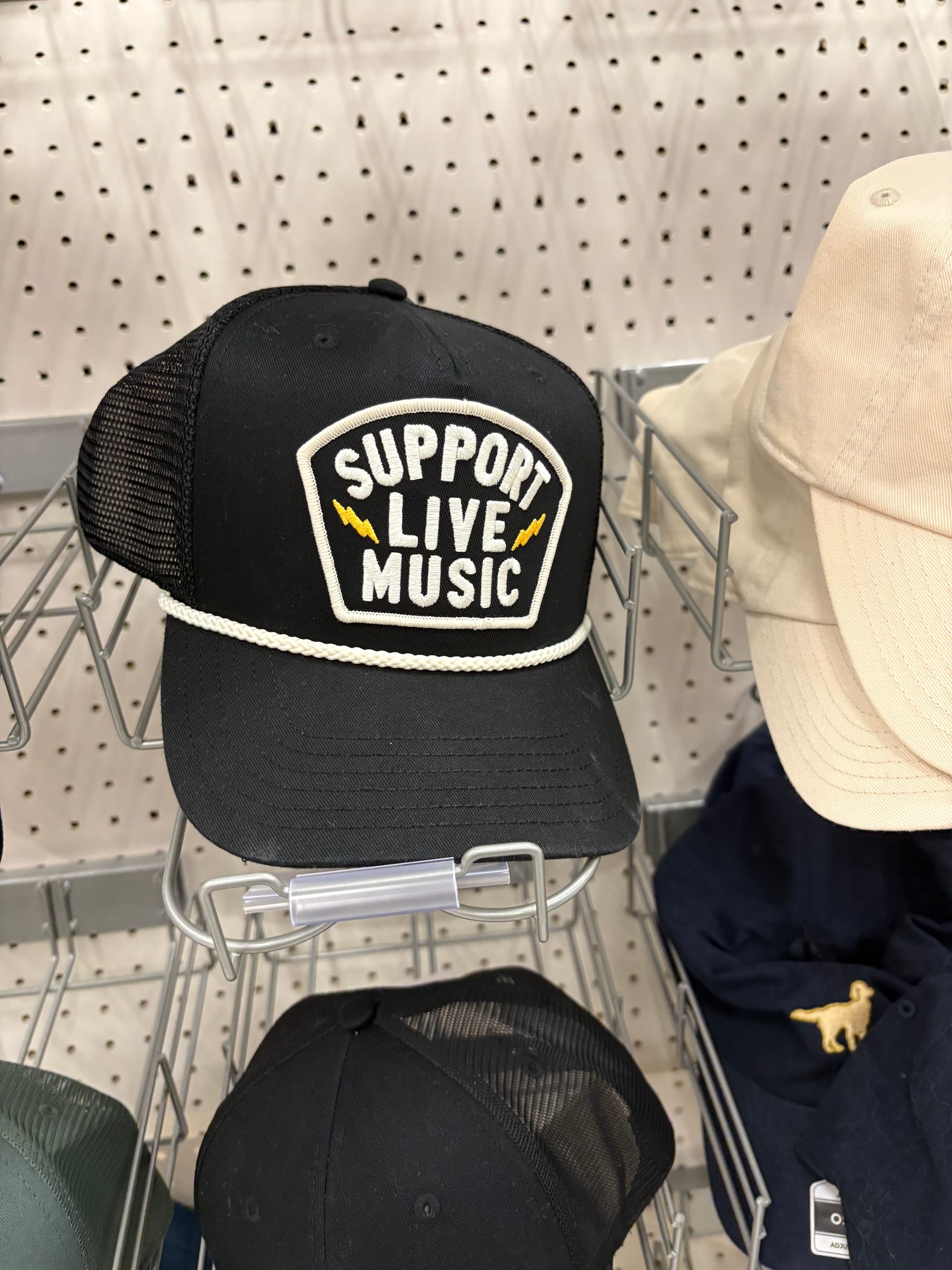 An image of a hat at Target that says “Support Live Music”