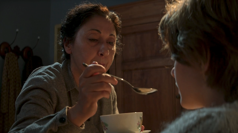 Immacolata feeds Lenu soup when she's sick with the flu.