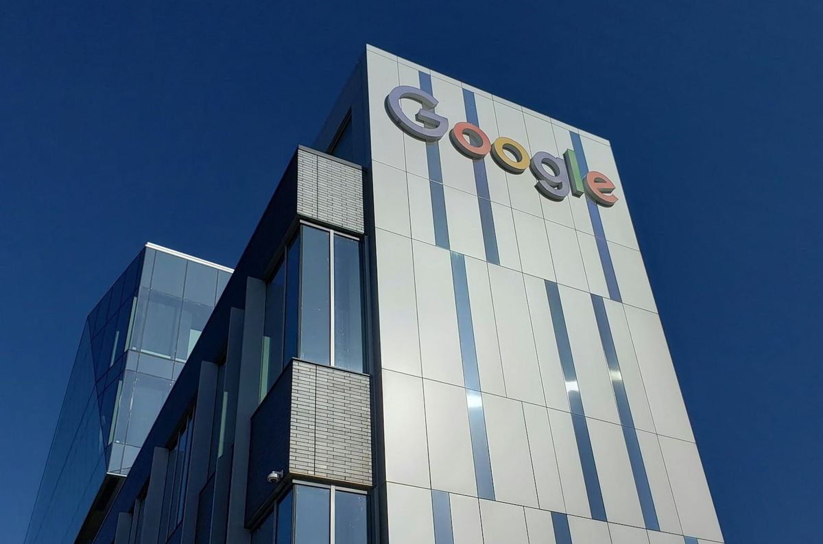 Google high rise building representing AI cloud infrastructure driving earnings and stock reactions