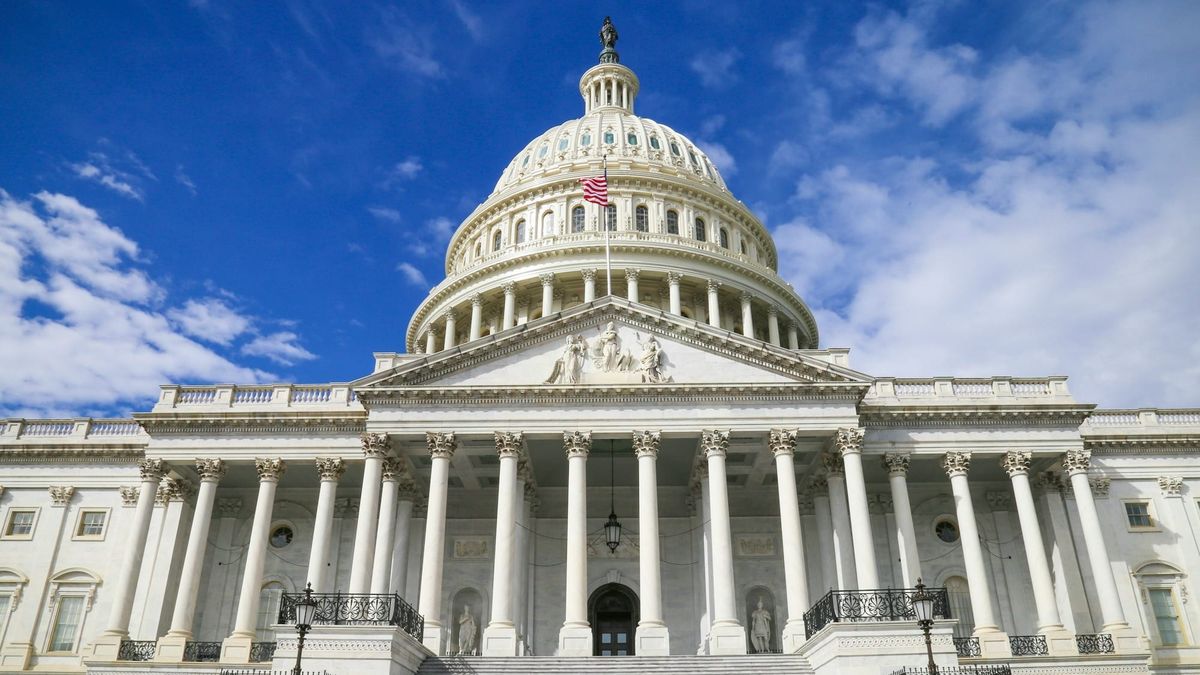 U.S. Capitol with stock market charts ahead of the 2026 midterm elections