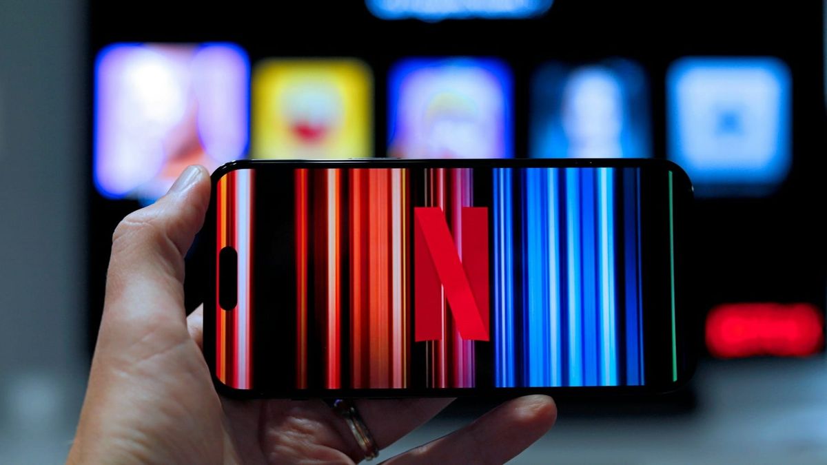 Netflix logo on a television screen as shares decline following weaker revenue and advertising guidance
