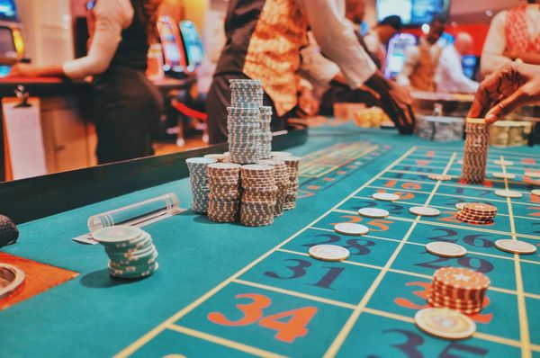 PENN Entertainment casino floor with digital sports betting screens showing strong retail and interactive growth trends