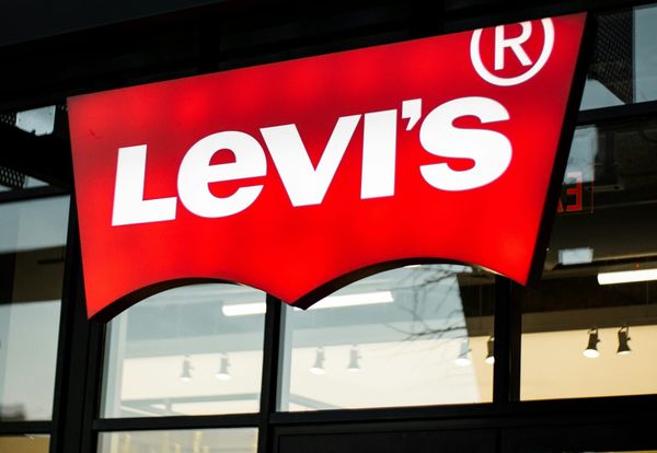 Levi Strauss retail store displaying denim apparel and lifestyle clothing, representing strong earnings growth and direct-to-consumer expansion.