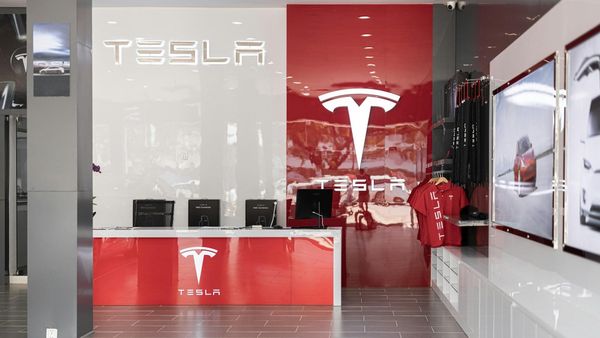 Tesla earnings report highlighting AI investment and margin pressure