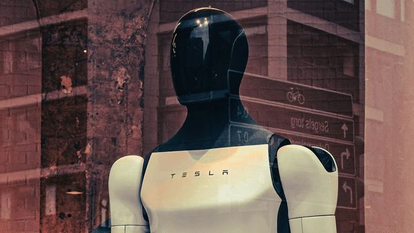 Tesla logo reflecting earnings pressure and investment in autonomous driving and Optimus robotics