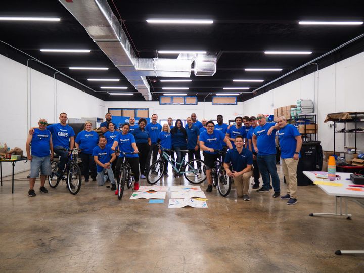 Freebee Cares - Donating bikes and helmets to Lotus House Miami.