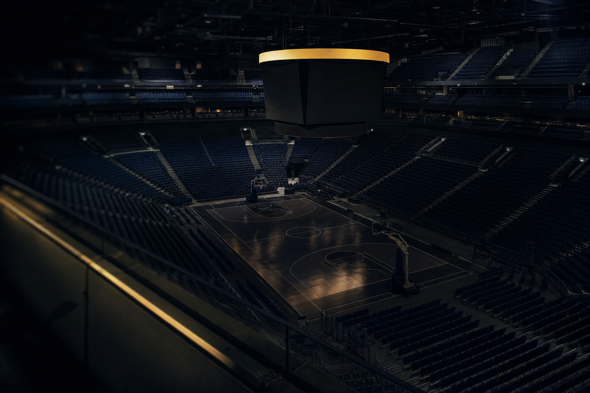 Empty basketball arena representing the scarcity premium in sports franchise valuations
