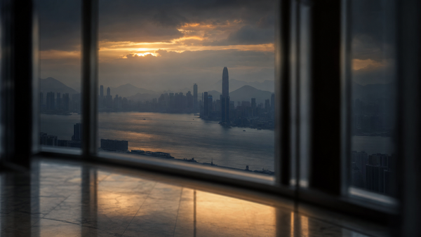 Hong Kong harbor at dawn seen through an office tower window with amber sunrise light reflecting on polished marble — Solomon Grey Capital editorial illustration for the Hang Seng bear mar...