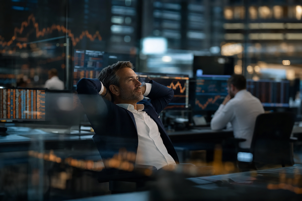 An institutional trading floor after a strong earnings season, with market screens softened into blue and amber light