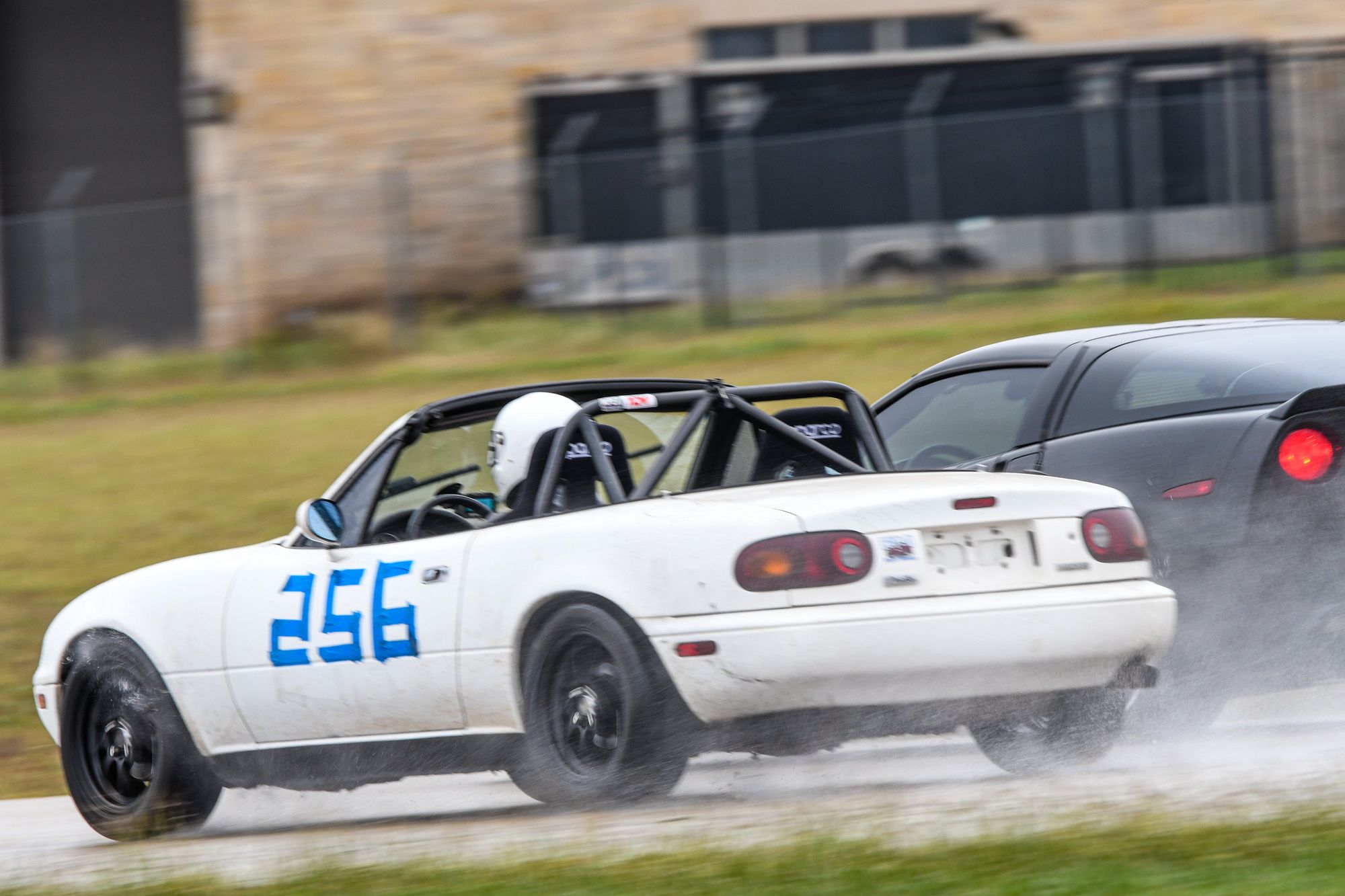Corvette getting absolutely owned by an NA Miata in the rain. Sure, maybe he was warm or whatever... and dry... ok maybe "owned" was too strong.