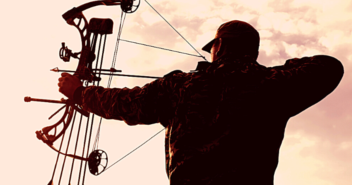 A hunter sitting quietly in a deer stand at sunrise, surrounded by autumn woods, symbolizing peace, solitude, and connection with nature.